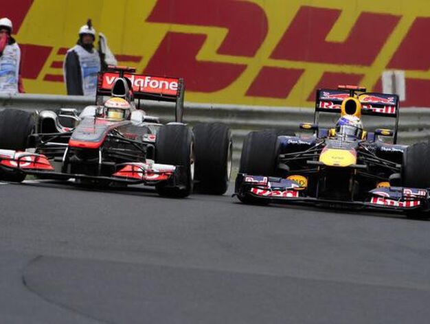 Hamilton y Vettel en paralelo.

Foto: AFP