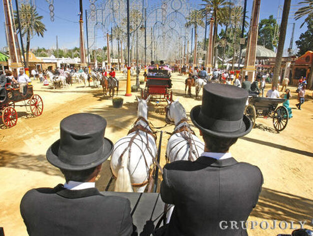 Los paseos en coche de caballo son una de las mejores formas de disfrutar de la Feria.

Foto: Pascual
