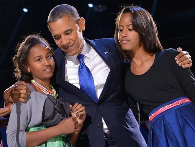 Obama con sus dos hijas.

Foto: Reuters