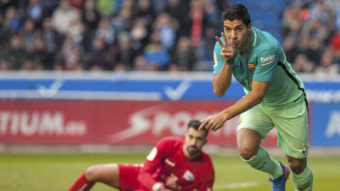 Suárez celebra uno de sus goles.