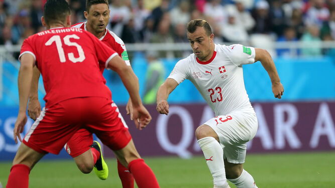 Un lance del partido del Suiza con Serbia.