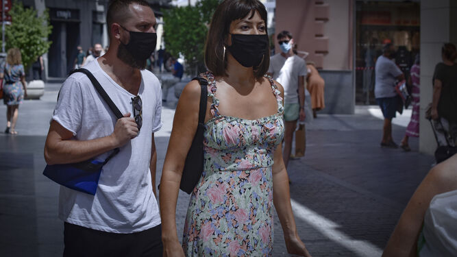 Mascarillas en Sevilla: de elemento sanitario a complemento de moda