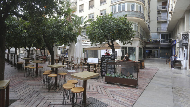 Terrazas vacías en el centro de Málaga