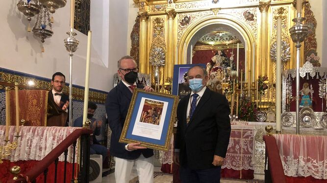 Diego J. Geniz y Andrés Martín, a las plantas de la Divina Pastora de las Almas.