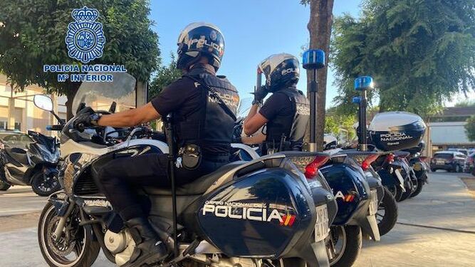 Cuatro detenidos por un atraco con arma de fuego en un comercio de Sevilla